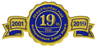 Gold and blue badge with scolling banners left and right giving our anniversary year!